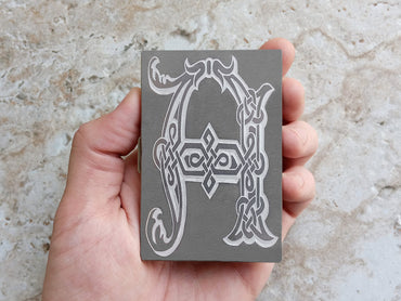 Custom Engraved Celtic Letters Stainless Steel Credit Card Holder in Hand