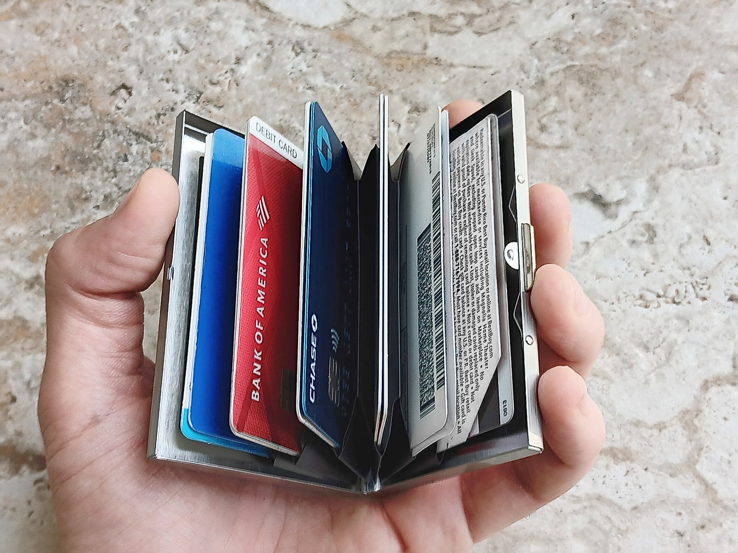 Opened View of Engraved Stainless Steel Credit Card Holder to show cards in their slots
