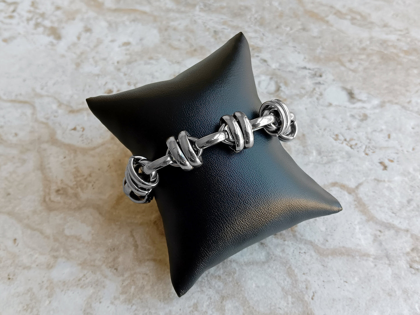 Double Ellipse Chain Bracelet on Bracelet Pillow