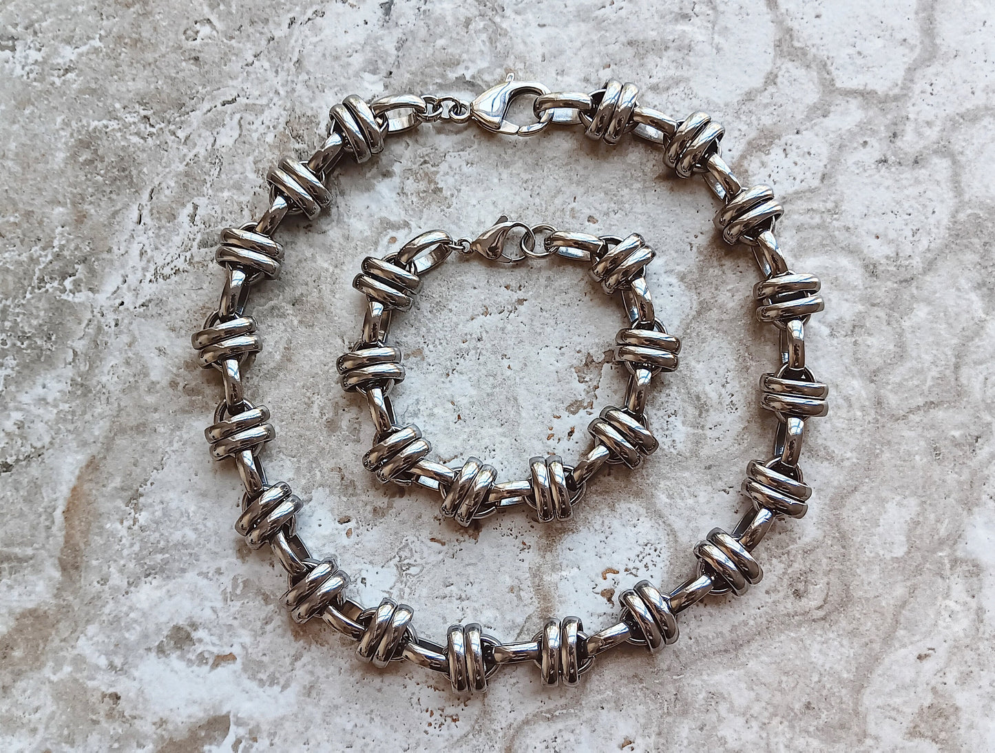 Top view of Double Ellipse Chain Necklace and Bracelet