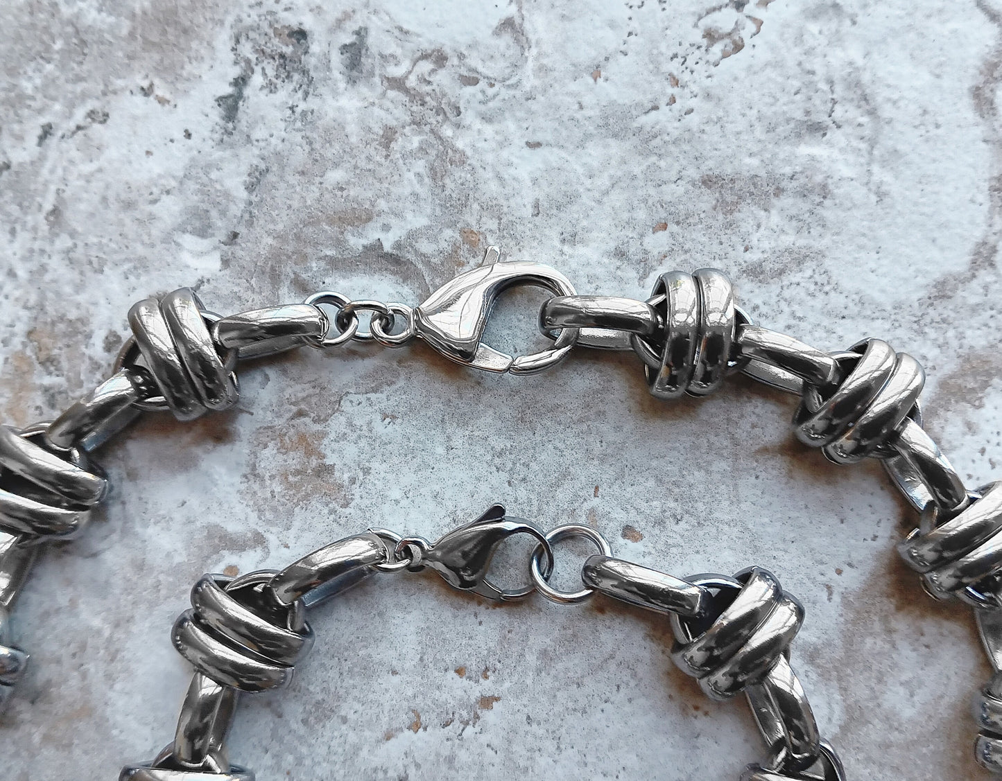 Close up of Lobster Clasps of Double Ellipse Chain Necklace and Bracelet