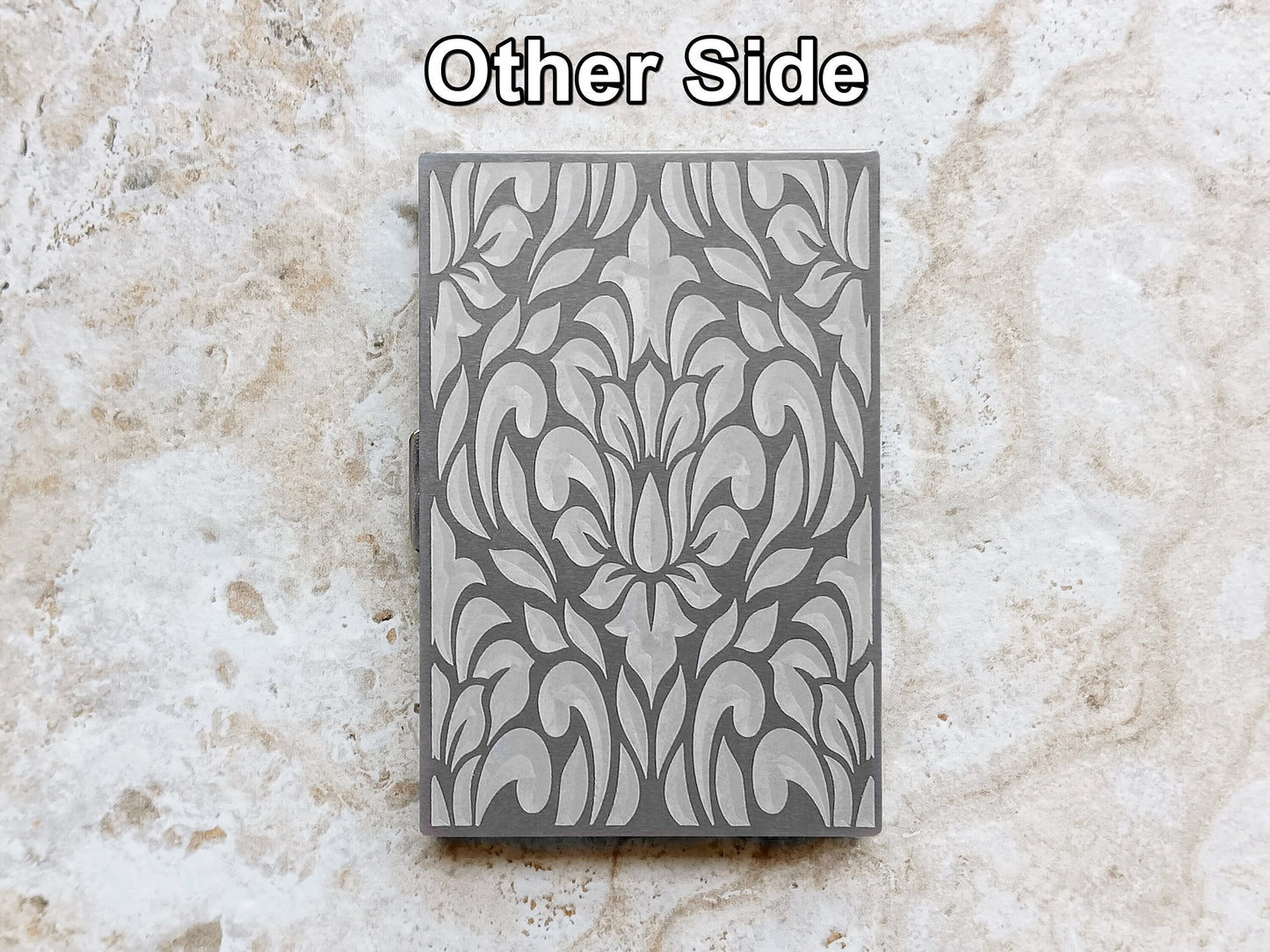 View of Floral Design on Engraved Stainless Steel Credit Card Case