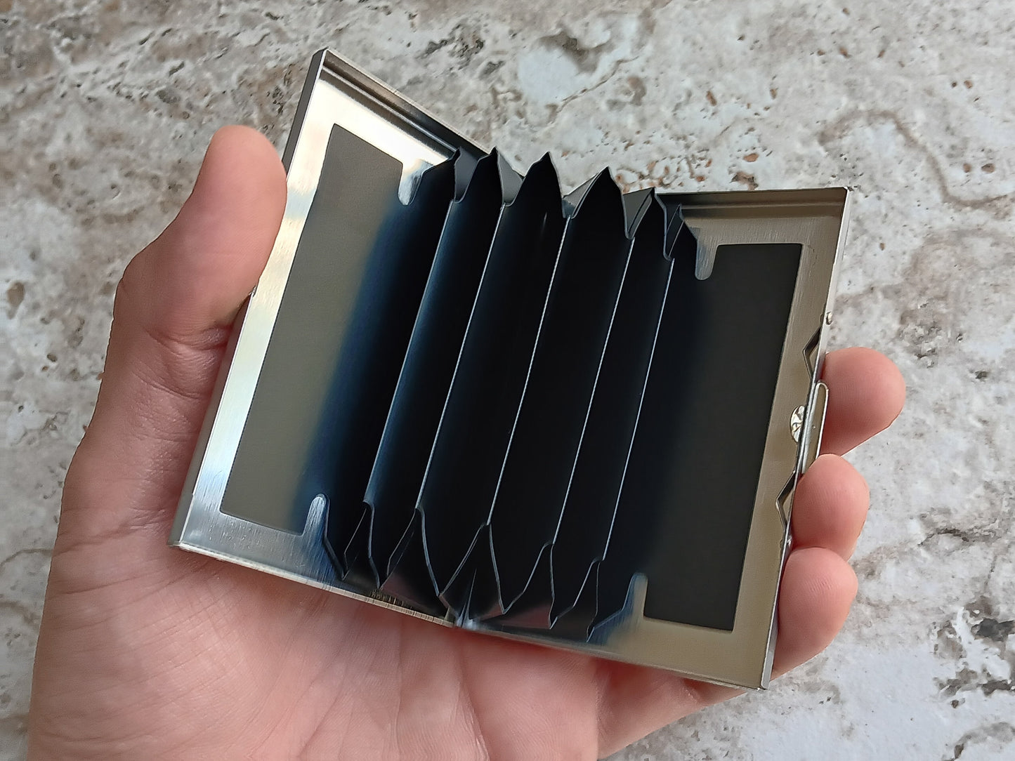 Stainless Steel Case Opened to show card slots and RFID protection.