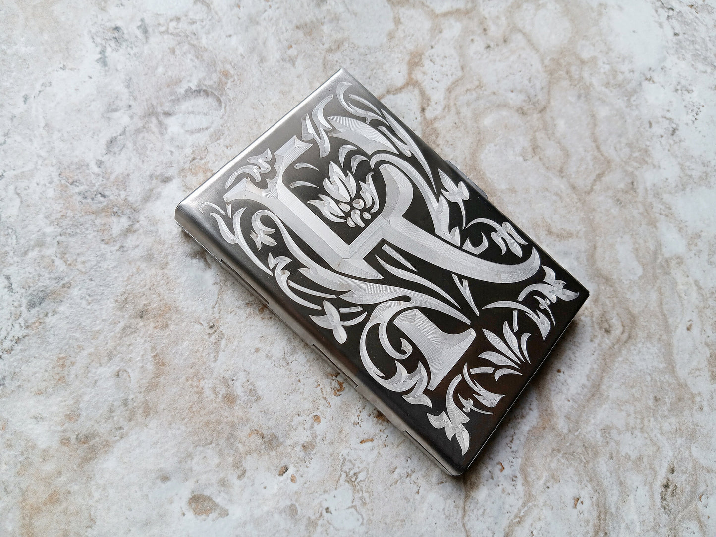Letter example engravedon the stainless steel card holder